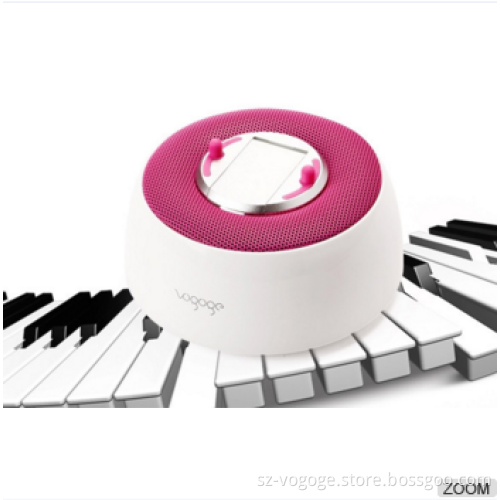 China Vogoge music cake speaker Hi-Fi stereo sound wireless bluetooth speaker with mobile phone holder